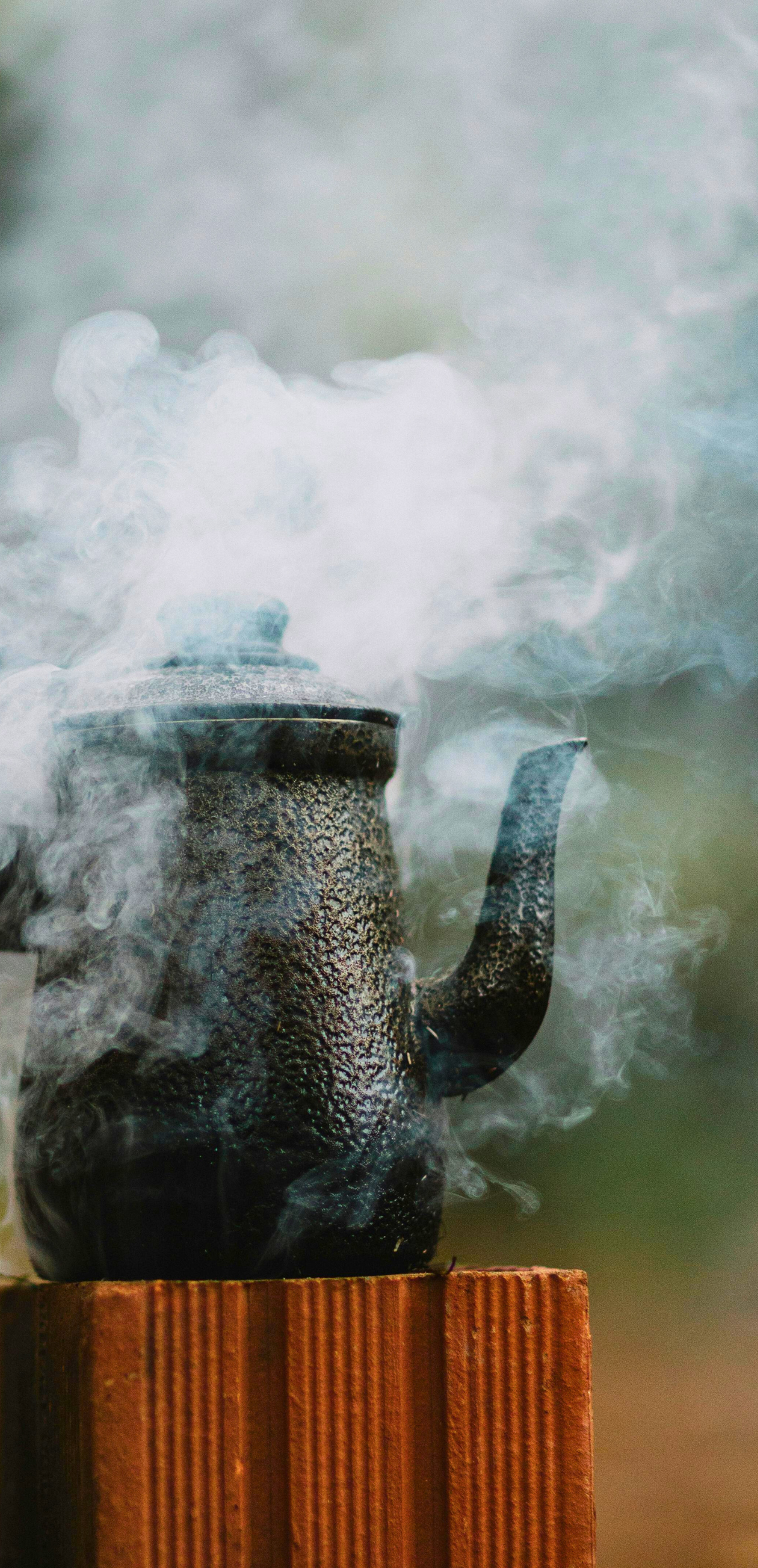 A steaming teapot